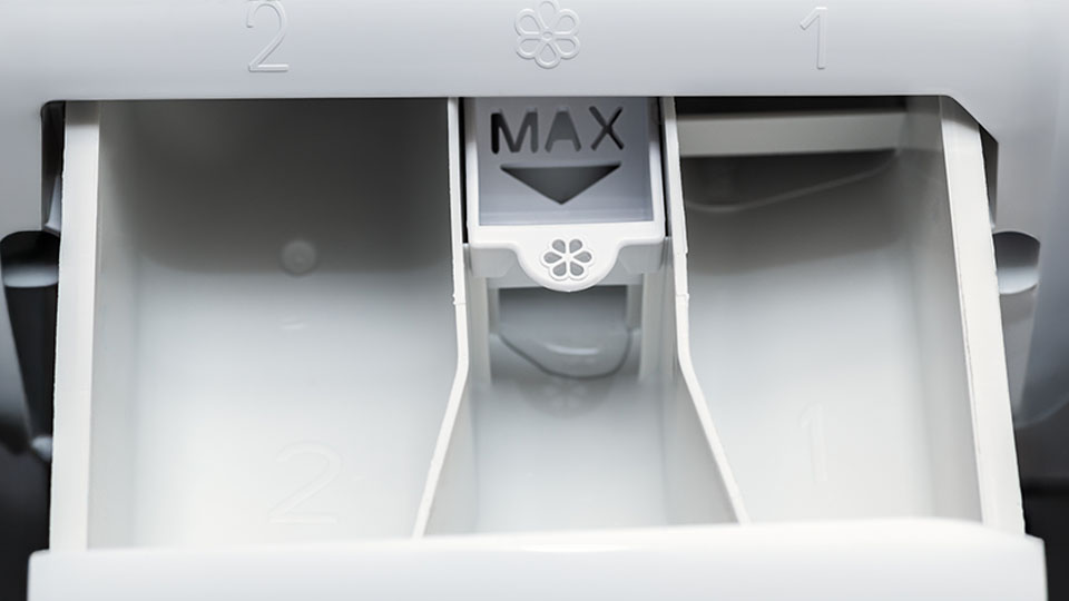 Waschmittelbehehälter in der Waschmaschine Waschmittelbehehälter in der Waschmaschine